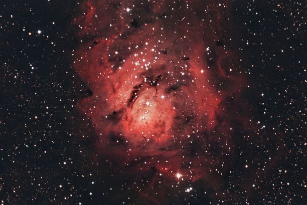 Image of Lagoon nebula through Vixen VC200L Reflector Telescope